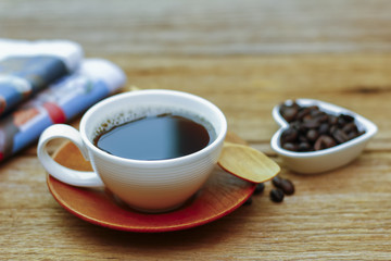 Stock Photo - Coffee, newspapers on wooden table