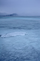 Incoming Tide on Snowy Alaska Beach 