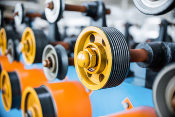 Transfer rubberized rollers of automatic winding machine.
