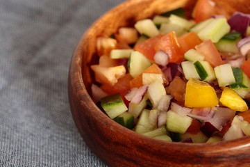Salad salsa in a wooden bowl