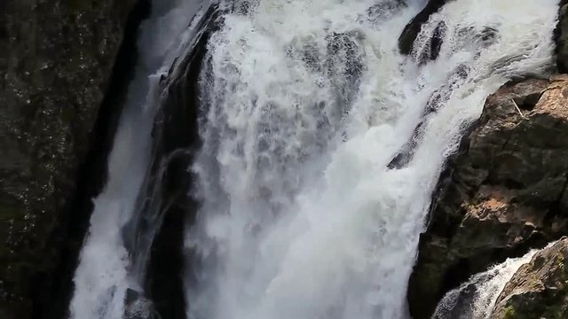 The falling water stream. Waterfall