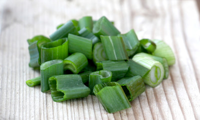spring vegetables, fresh  onion on wood background