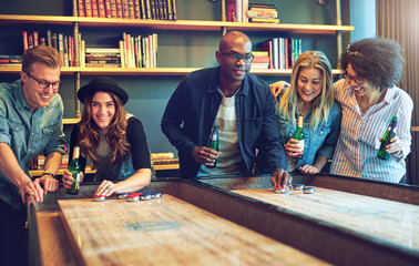 Group of friends having fun playing a game