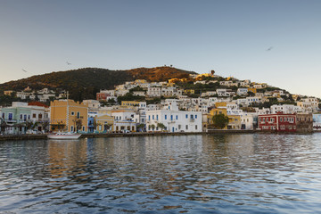 View of the seafront of Agia Marina village on Leros island in Greece early in the morning. 
