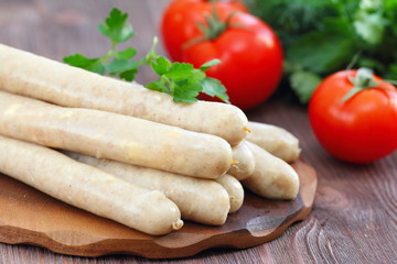 Raw chicken sausages prepared for frying