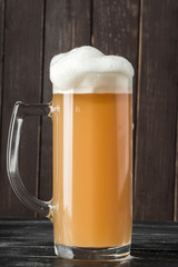 beer glass on a wooden background