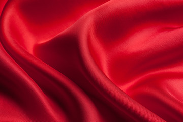 Naklejka na ściany i meble Red cloth waves background texture