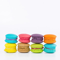 Sweet and colorful french macaroons or macaron on white background, Dessert.