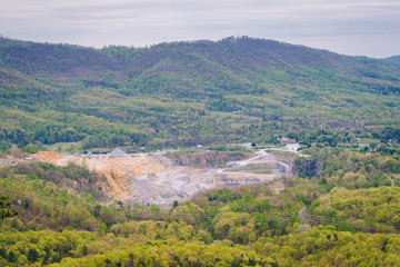 Fototapeta na wymiar View of a quarry in the Blue Ridge Mountains from the Blue Ridge Parkway in Virginia.