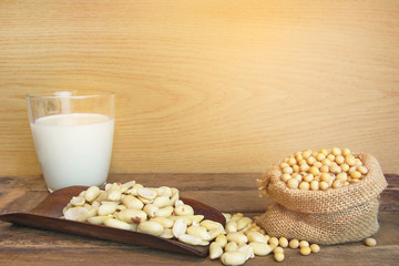 Low key of image of Soybeans and soy milk on wood vintage.