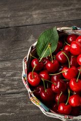 basket with fresh sour cherries.