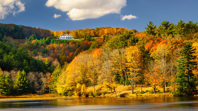 Autumn view of Moses Cone Manor from Bass Lake near the Blue Ridge Parkway