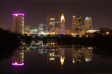 Skyline of Columbus, OH at night. Taken from across the Scioto River, with reflection in water