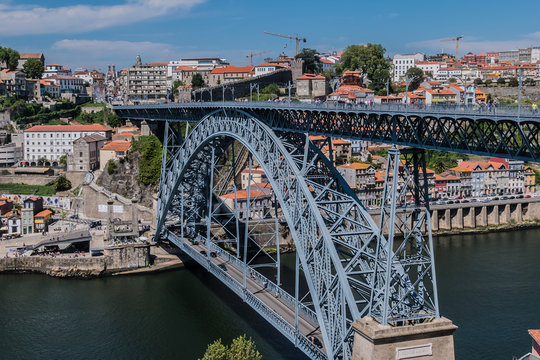 Iconic Dom Luis I bridge (1886), Douro River, Porto, Portugal. 