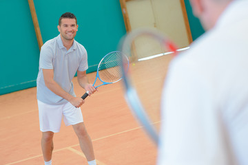 playing a tennis match