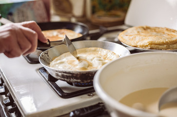 Grandmother making pancakes