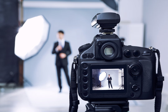 Closeup View Of Professional Camera In Studio