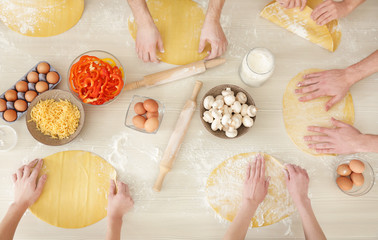 Group of people preparing food at cooking classes