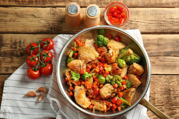 Chicken stir fry with vegetables in pan