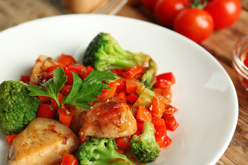 Chicken stir fry on plate, closeup