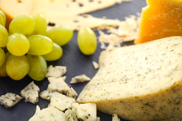 Delicious sliced cheese, closeup