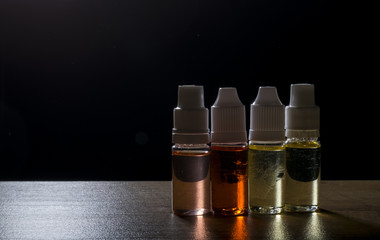 electronic cigarette, vaping device with e liquid background.