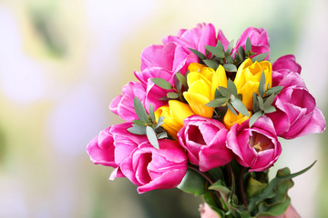 Obraz na płótnie Canvas Beautiful bouquet of spring flowers on blurred background