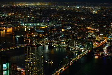 Fototapeta na wymiar Brooklyn and Manhattan Bridge at night from above