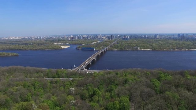 Kiev in spring park river and bridge on the horizon