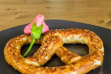 Closeup of Oktoberfest soft salted pretzels served on a plate from Germany