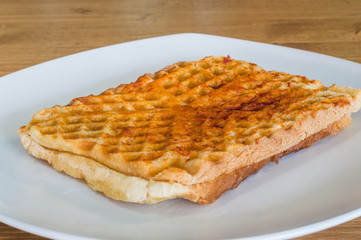 Closeup of Turkish toast, toasted sandwich with cheddar cheese