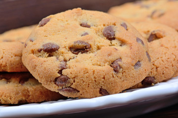 Plate with cookies on table