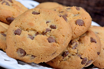 Sweet chocolate chip cookies on plate
