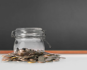 Silver coins in  piggy bank Glass