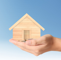 Naklejka premium Mortgage concept by house from in hand