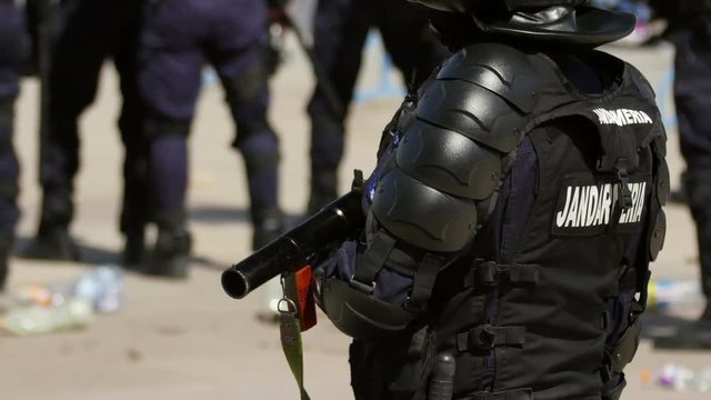 Gendarmes ready to take action during a riot
