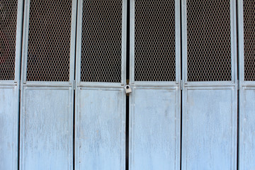 Metal blue door with lock in Asian style