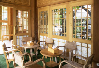 Modern and simple cafe interior with wooden classical furniture