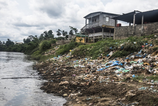 Rubbish and pollution on the banks of a river