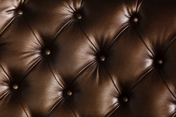 Golden Vintage leather close-up Sofa background Vintage brown leather