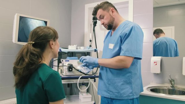 Doctor makes a gastroscopy young girl through the mouth 4k