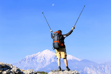 Hiking in the mountains in the summer on a sunny day.