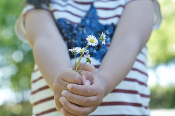 A girl with white flowers