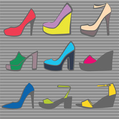 A set of multi-colored women's shoes on a gray background