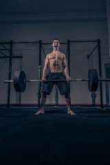 bodybuilder muscular deadlift, dark indoors gym, shouting screaming