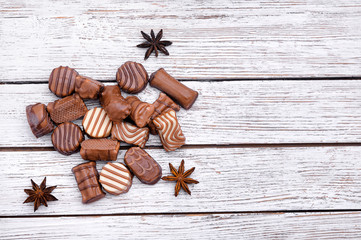 set of chocolates on a beautiful wooden table