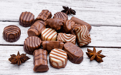 set of chocolates on a beautiful wooden table