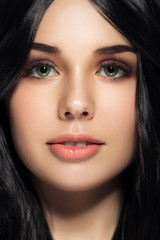 Close Up Portrait Of Beautiful Young Brunette Woman.