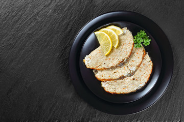 Gefilte minced carp fillets cut in slices