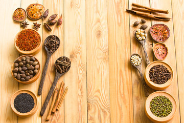 Herbs and spices on a wooden board